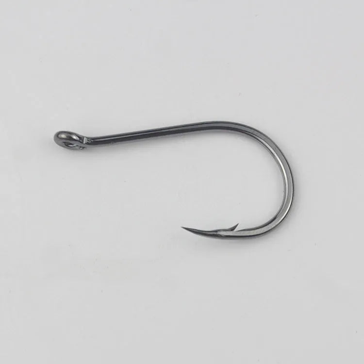Barbed fishing hooks with hole ring in a bulk pack on a blue background.