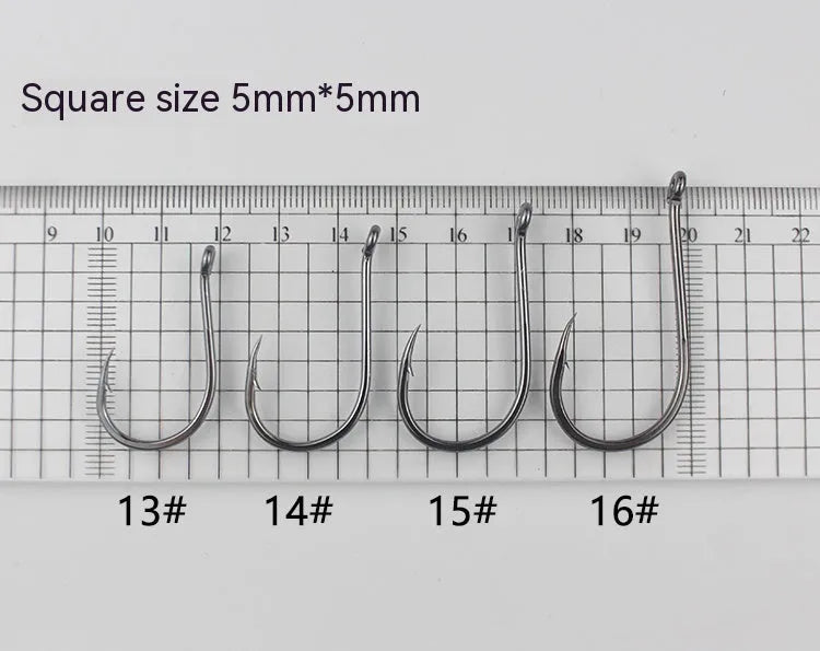 Barbed fishing hooks with hole ring in a bulk pack on a blue background.