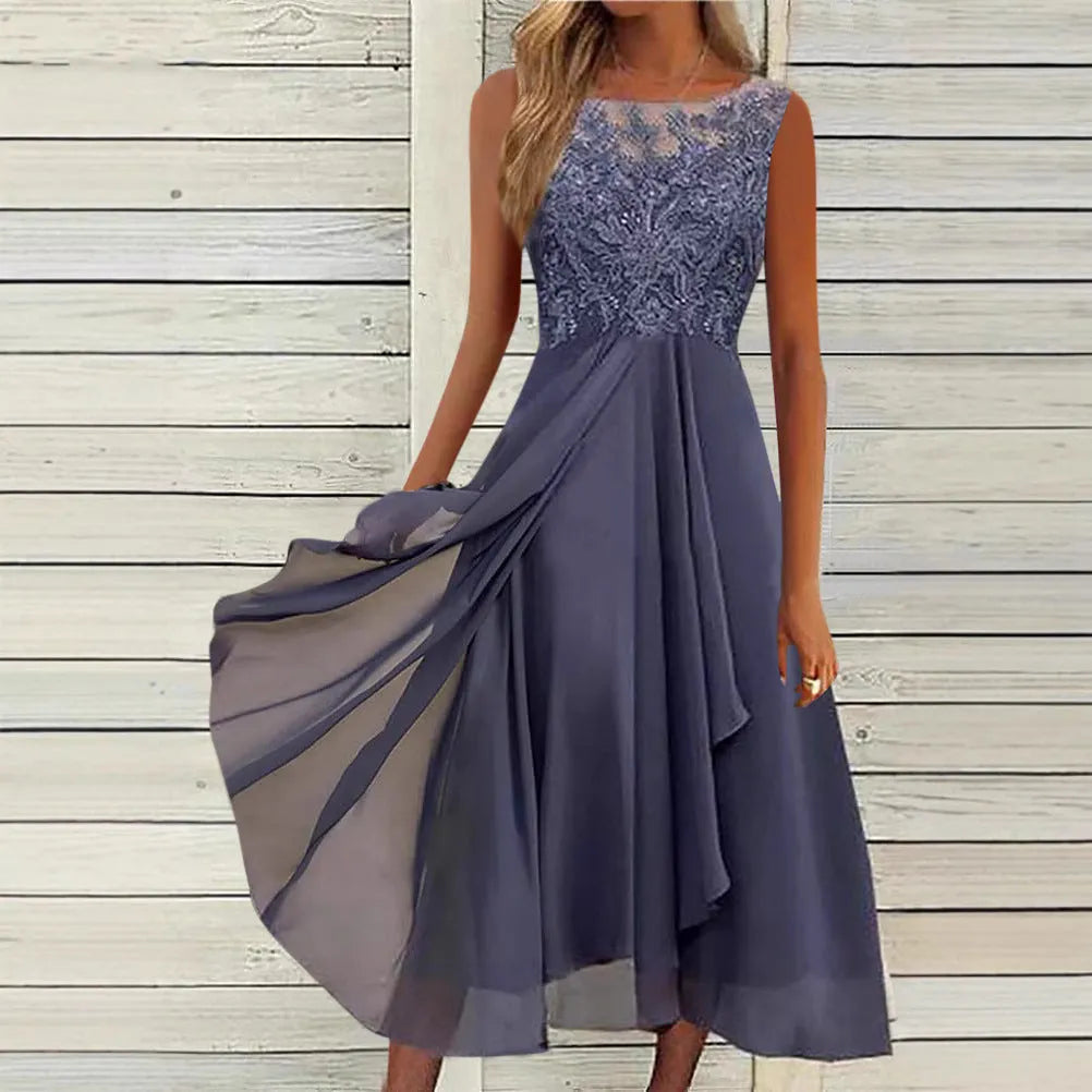 Women's sleeveless green chiffon dress with lace hollow-out detail and a mid-length flared skirt.