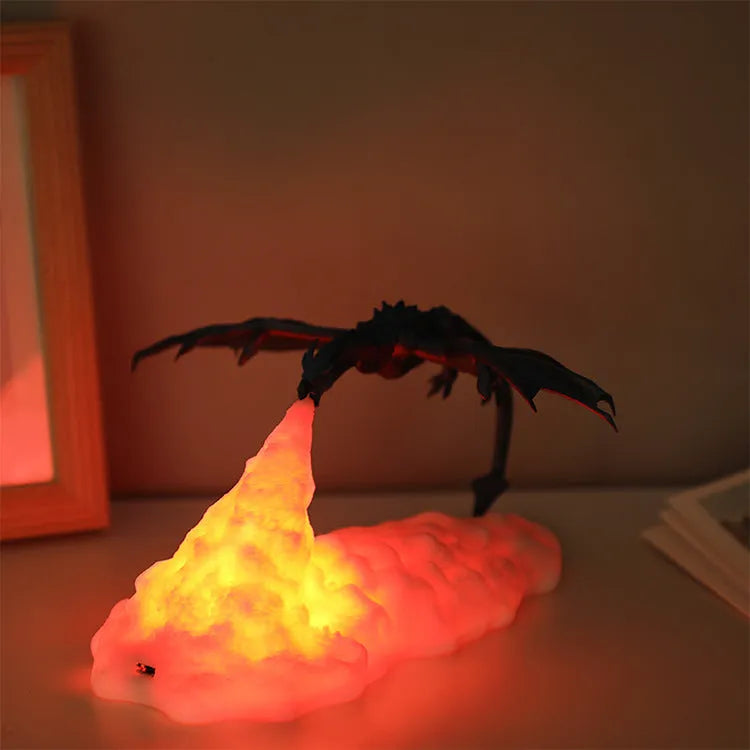 3D printed red dragon night light with glowing effect on a dark surface