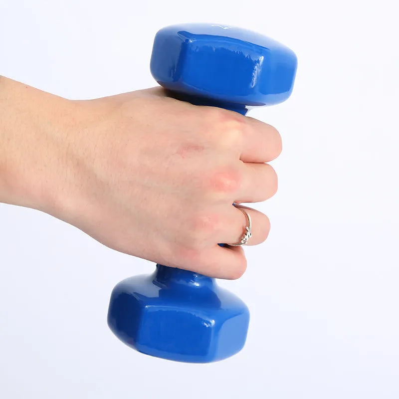Bright coloured plastic-coated fitness dumbbells in 0.5kg, 1kg and 1.5kg weights for floor-protected workouts