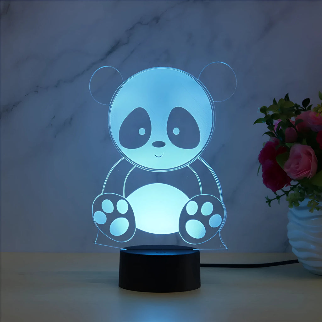 Panda-shaped acrylic night light with remote control on a black ABS base