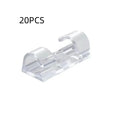 Transparent self-adhesive plastic cable management clips in a pack of 20 pieces.