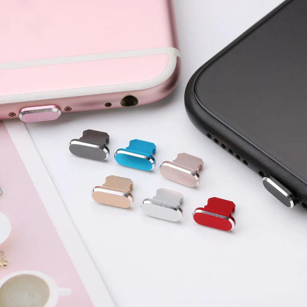 Aluminium alloy iPhone charging port dust plug shown in various colours including gold, silver, blue, and rose gold.