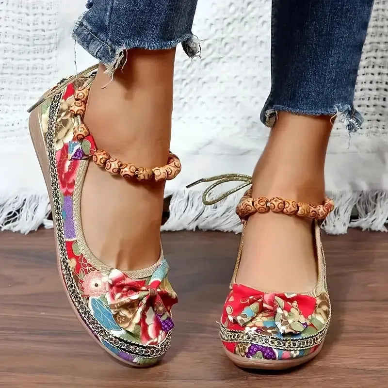 Women's plus size ethnic platform sandals with cloth upper, elastic band, and round toe in black or red