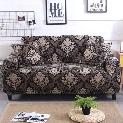 Geometric patterned stretch sofa slipcover fitted on a three-seater sofa in a living room.