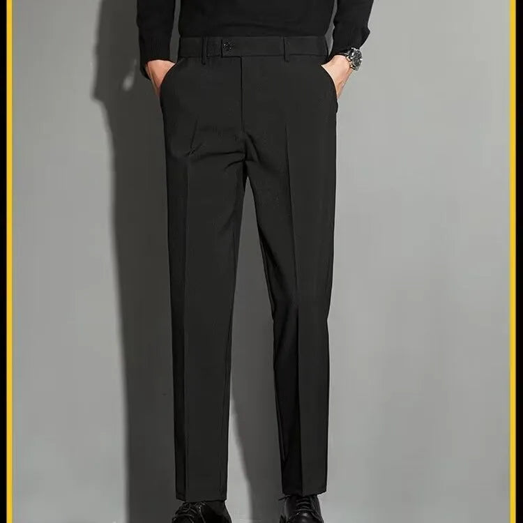 Men's straight-leg ankle-length suit trousers in a chemical fibre blend fabric shown in a classic colour.