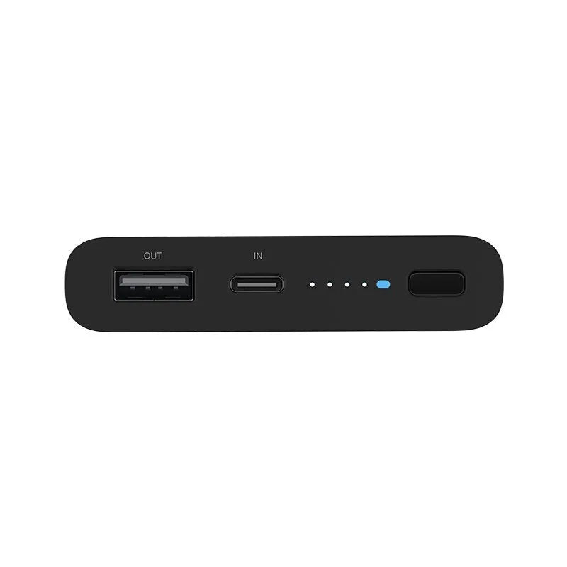 Black and white 10000 mAh power bank with USB Type-C port and wireless charging surface.