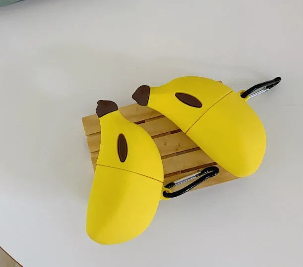Yellow banana shaped silicone protective case compatible with Apple AirPods Pro wireless headset