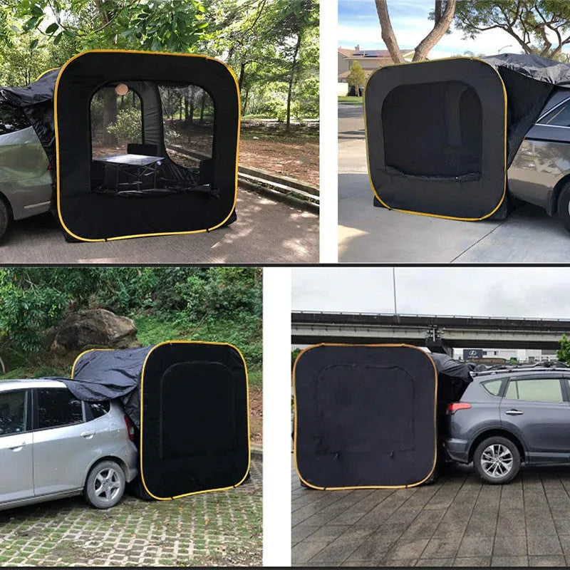 Black pop-up car tailgate camping tent unfolded next to a vehicle