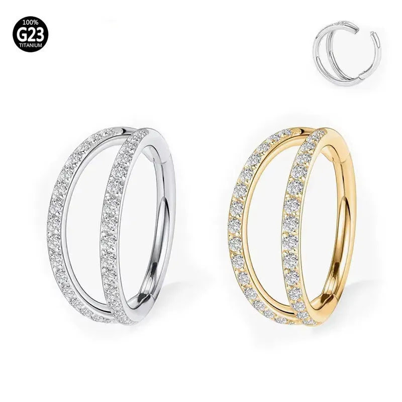 G23 titanium alloy lip ring and nose ring in gold and steel colour on a white background.