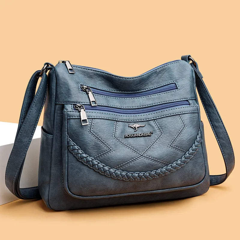 Women's soft PU leather crossbody shoulder bag in horizontal square shape with sandwich pocket