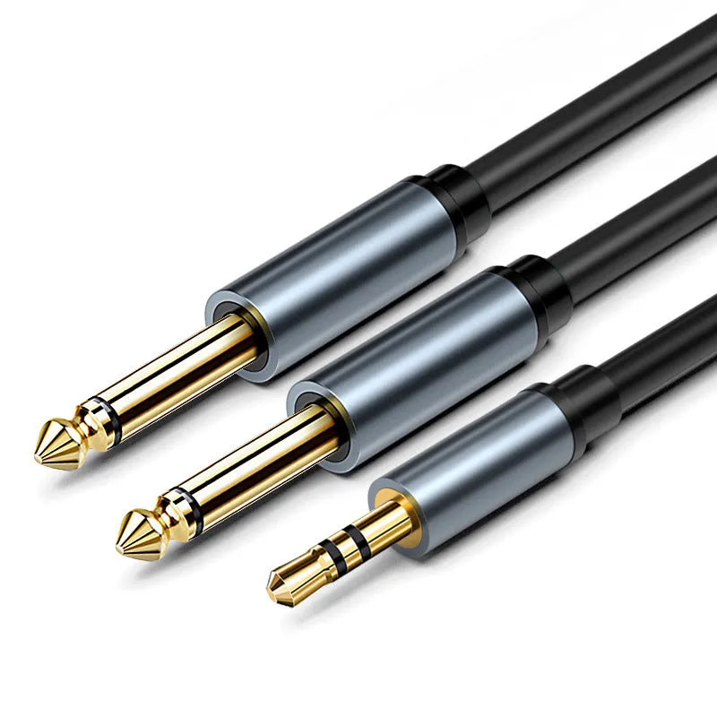 3.5mm stereo plug to two 6.35mm plug audio cable on a grey background