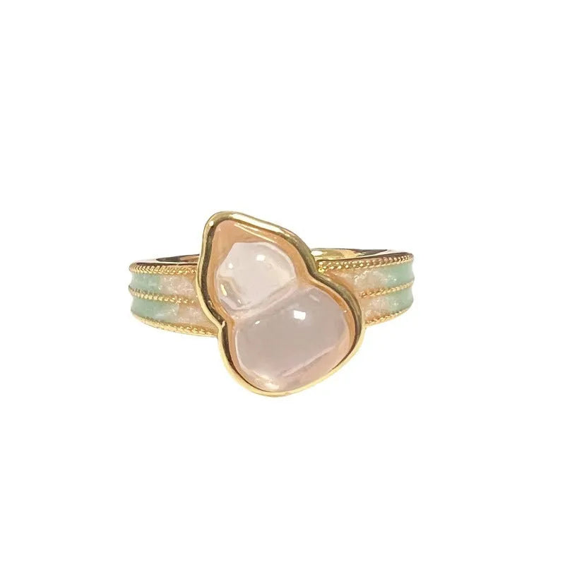 Adjustable vintage oil dripping finish copper ring with gourd motif and inlaid zircon stones.