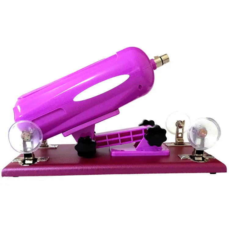 Purple automatic telescopic thrusting sex toy made from PVC on a white background.