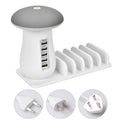 White mushroom-shaped USB charging dock station with 5 ports and integrated LED night light on desk