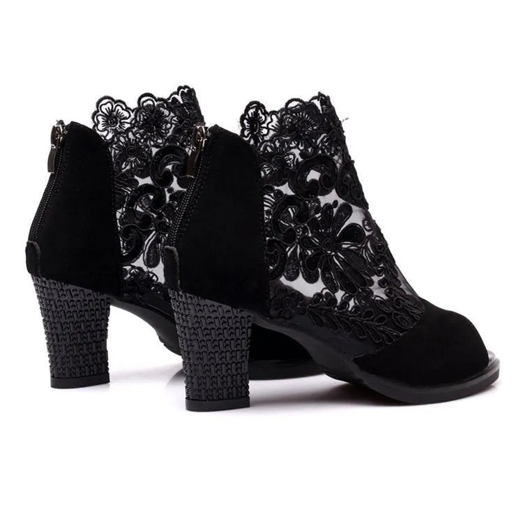 Black lace gladiator sandals with square high heel, peep toe and front zip closure