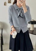 Milky white lazy fashion lapel scarf cardigan sweater with splicing detail and long sleeves.