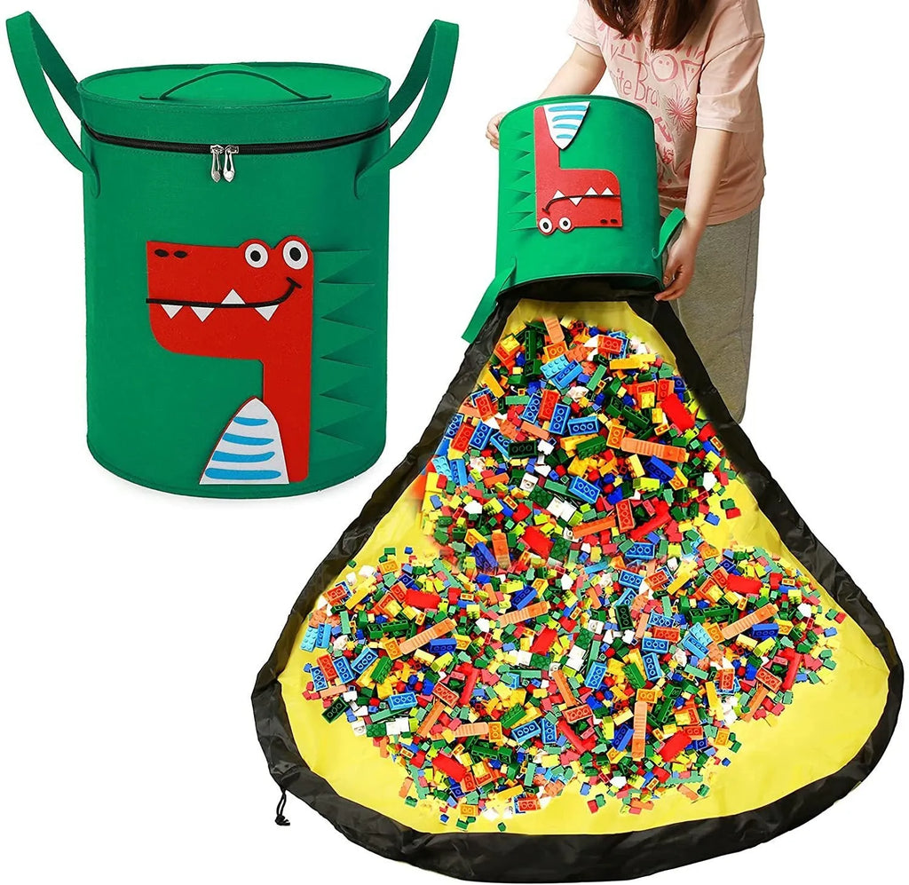 Green felt cube storage bag open as play mat with toys inside and pull rope visible