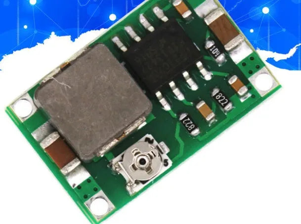 Green Mini-360 DC-DC buck converter module measuring 17x11mm with adjustable output voltage
