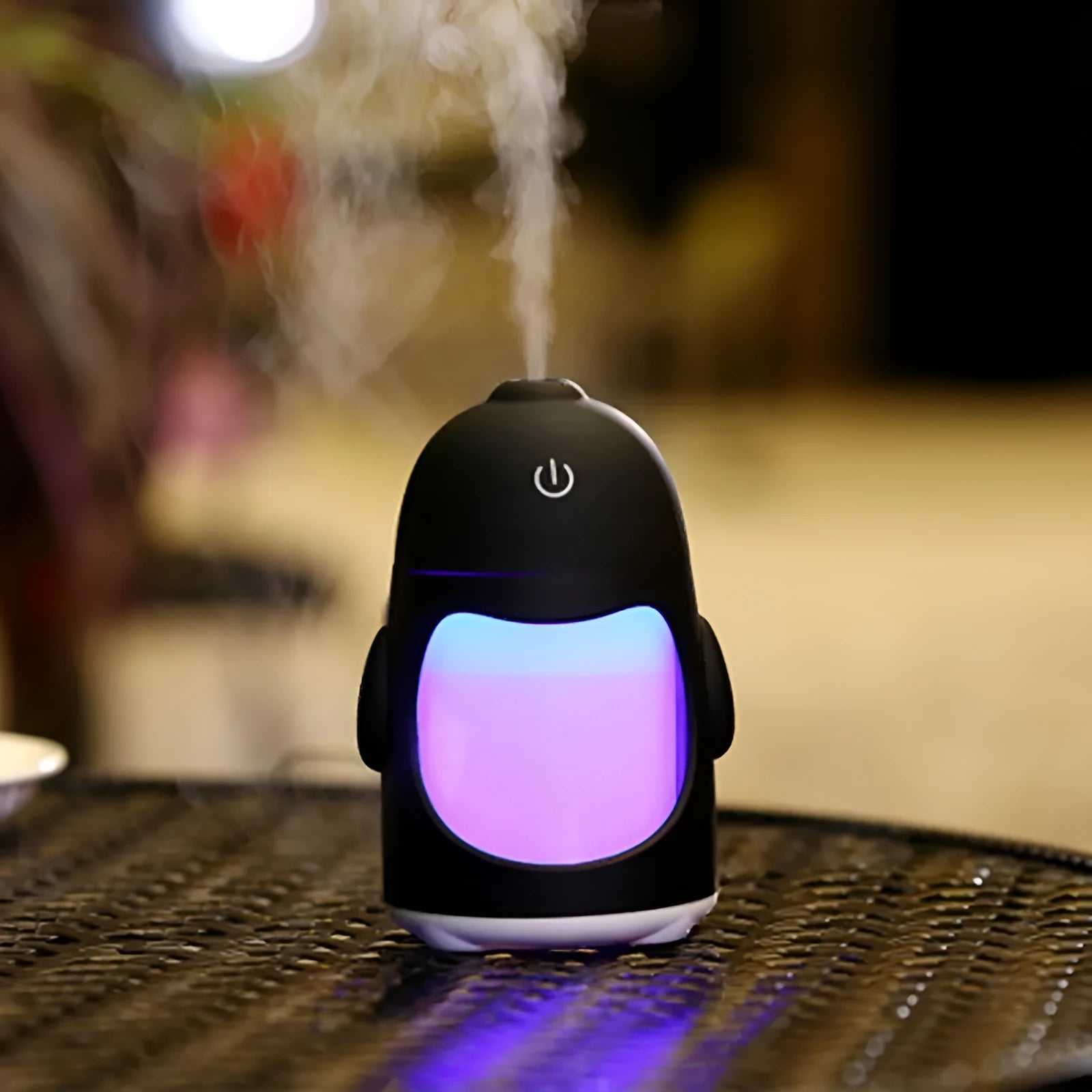 Penguin car humidifier with 400ml tank and colourful night light on a desk