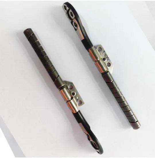 MacBook Pro 15-inch A1286 laptop screen replacement hinge shaft pair on foam packaging.