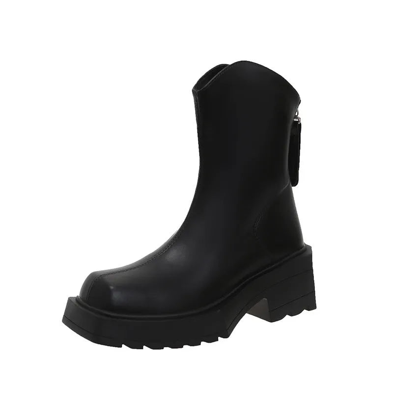 Black platform Martin ankle boots for women with a square toe and back zipper on a white background.