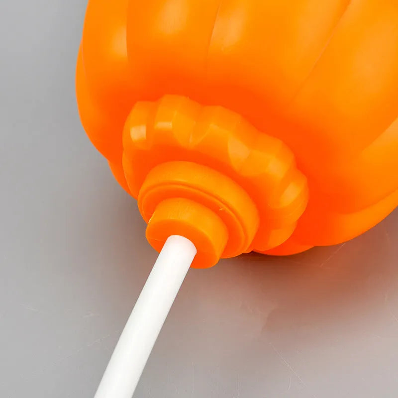 Pumpkin shaped USB rechargeable lamp with yellow or purple light options for holiday decoration
