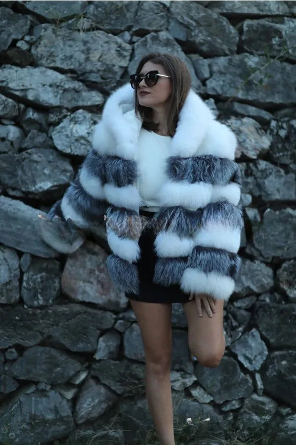 Women's loose fit hooded faux fur coat in street fashion style showing brown colour option