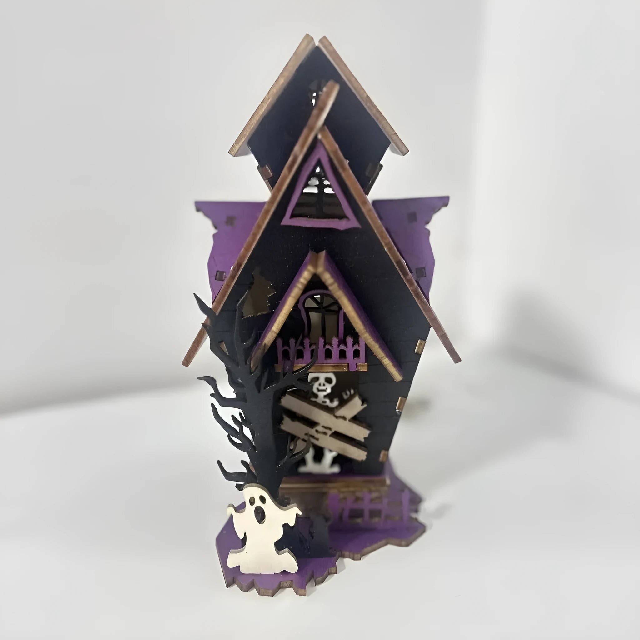 Wooden Halloween haunted house decoration with luminous finish on tabletop