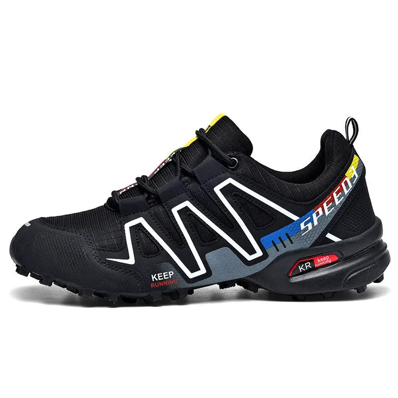 Men's grey orange and black white wide fit casual running shoes with low top design.