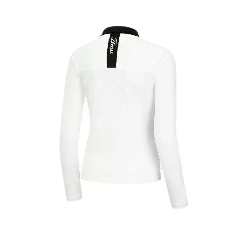 Women's white long sleeve slim fit golf top with polyester athletic fabric
