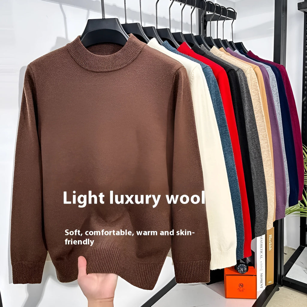 Men's fine wool half turtleneck pullover in a solid colour, shown in regular fit with long sleeves.