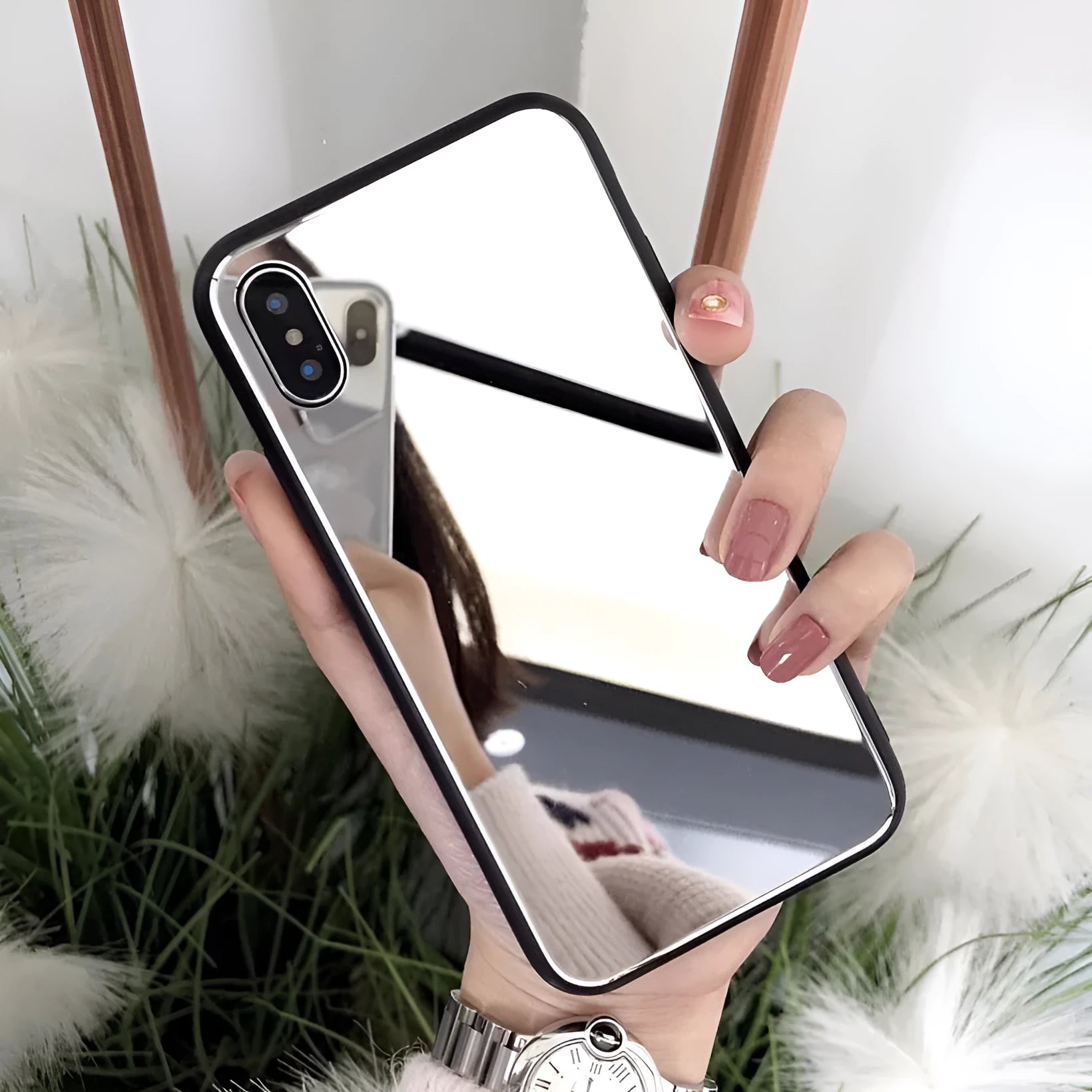 Black mirror back cover phone case for iPhone X showing reflective surface.