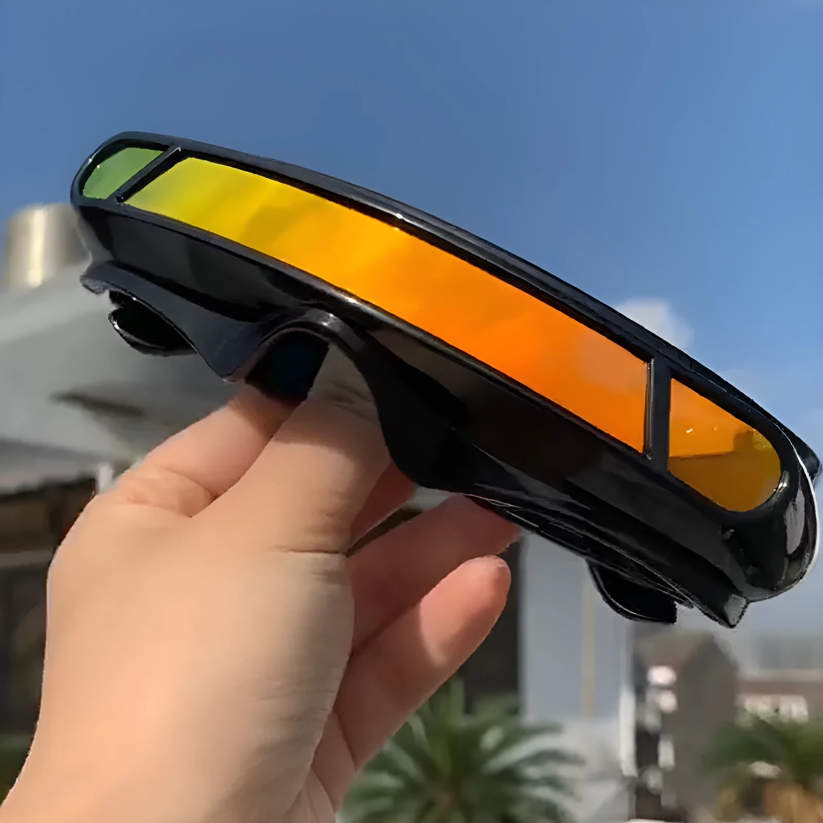 Black polarised sports sunglasses with a choice of grey, red mercury, or blue mercury colour film lenses.