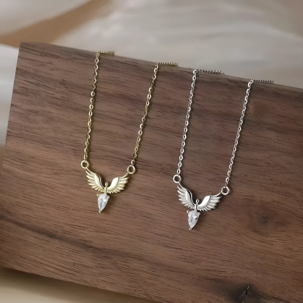 Close-up of a women's silver eagle pendant necklace on an O-ring chain with adjustable length.