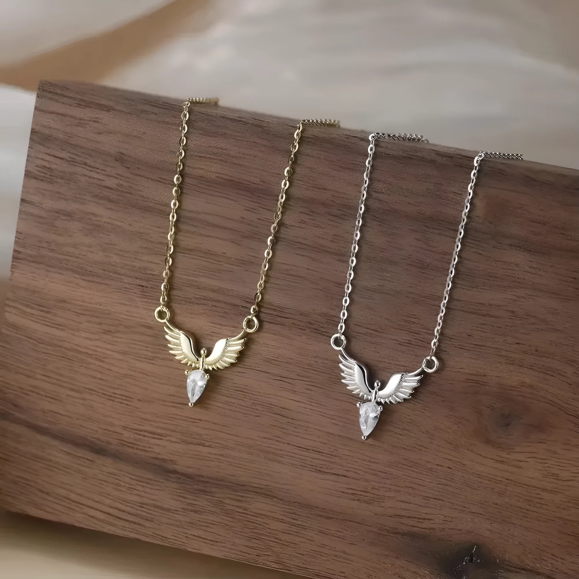 Close-up of a women's silver eagle pendant necklace on an O-ring chain with adjustable length.