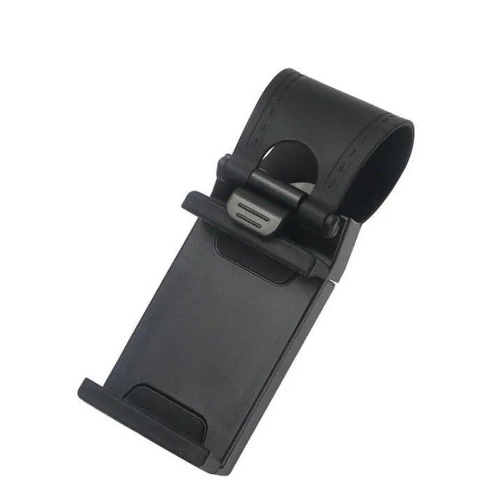 Black universal steering wheel phone holder clip mounted on a car steering wheel.