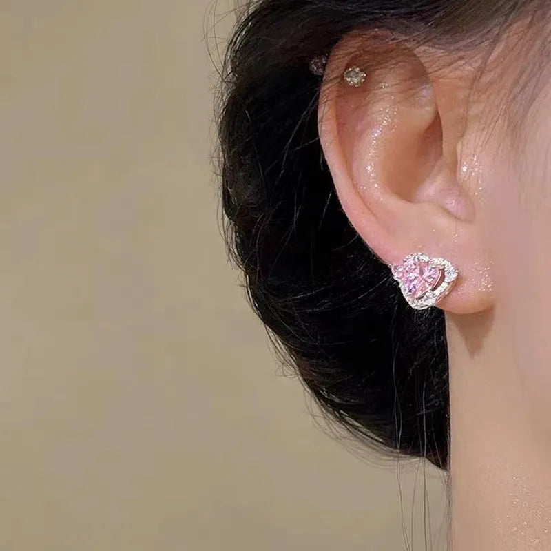Women's heart stud earrings with white K electroplated finish on copper