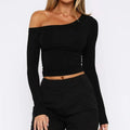 Women's slim-fit long-sleeve knitted cardigan in solid colour with cross shoulder straps.