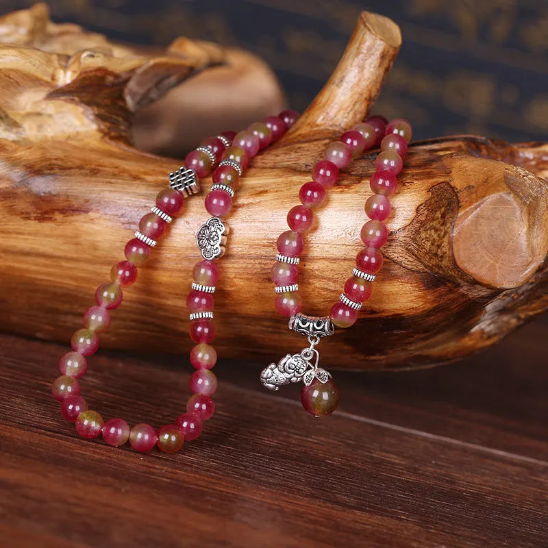Natural watermelon crystal bracelet with Chinese knot design in 6mm and 8mm size options