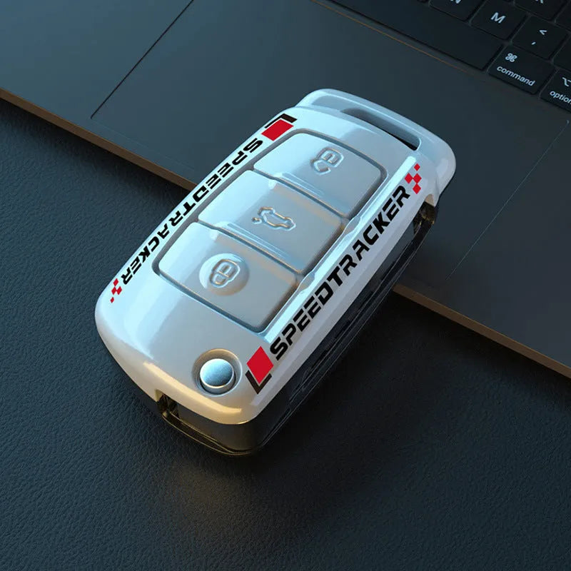 Carbon fibre style car key cover with mirror accent in carbon and white colour options