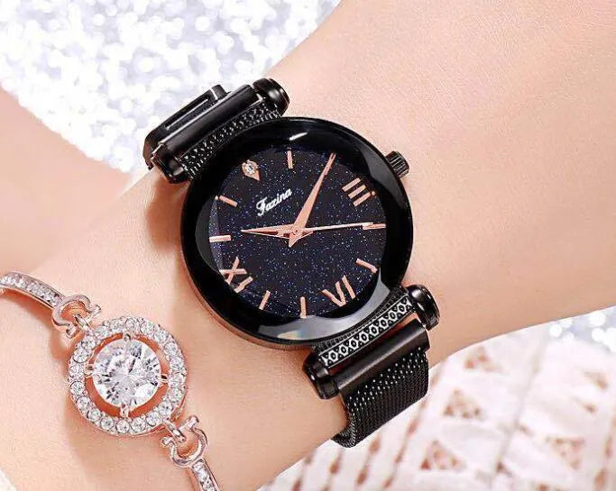 Fashion Watches analog quartz watch with stainless steel band on wrist, black dial visible