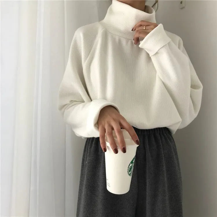 Women's half-high collar long sleeve loose top in solid apricot colour