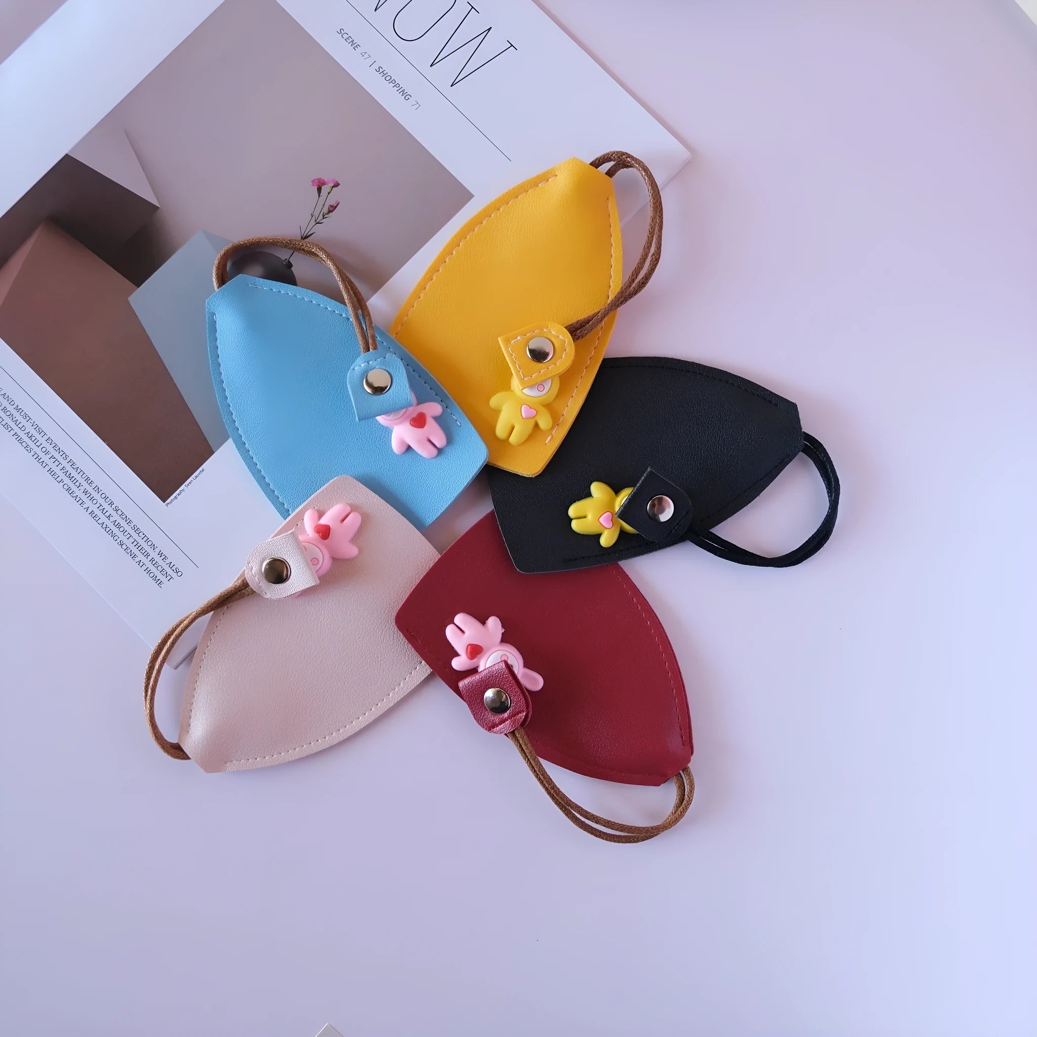 PU leather car key case showing interior storage for keys and credit cards in available colour options