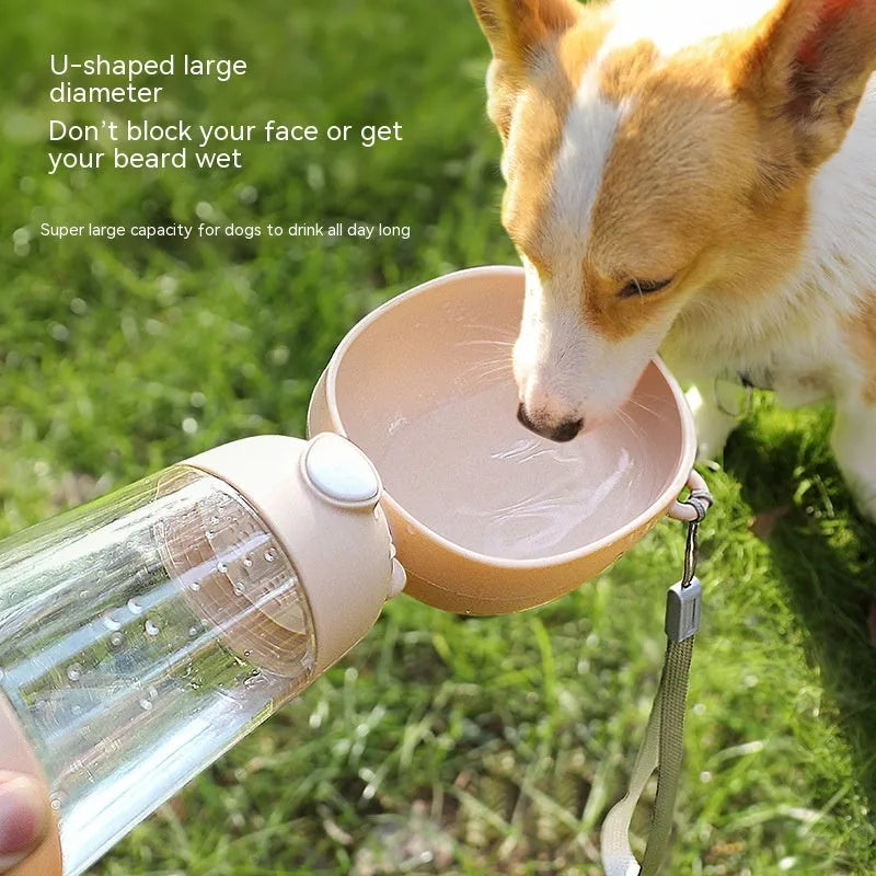 Portable dog water bottle with integrated food container in brown, pink and yellow colour options
