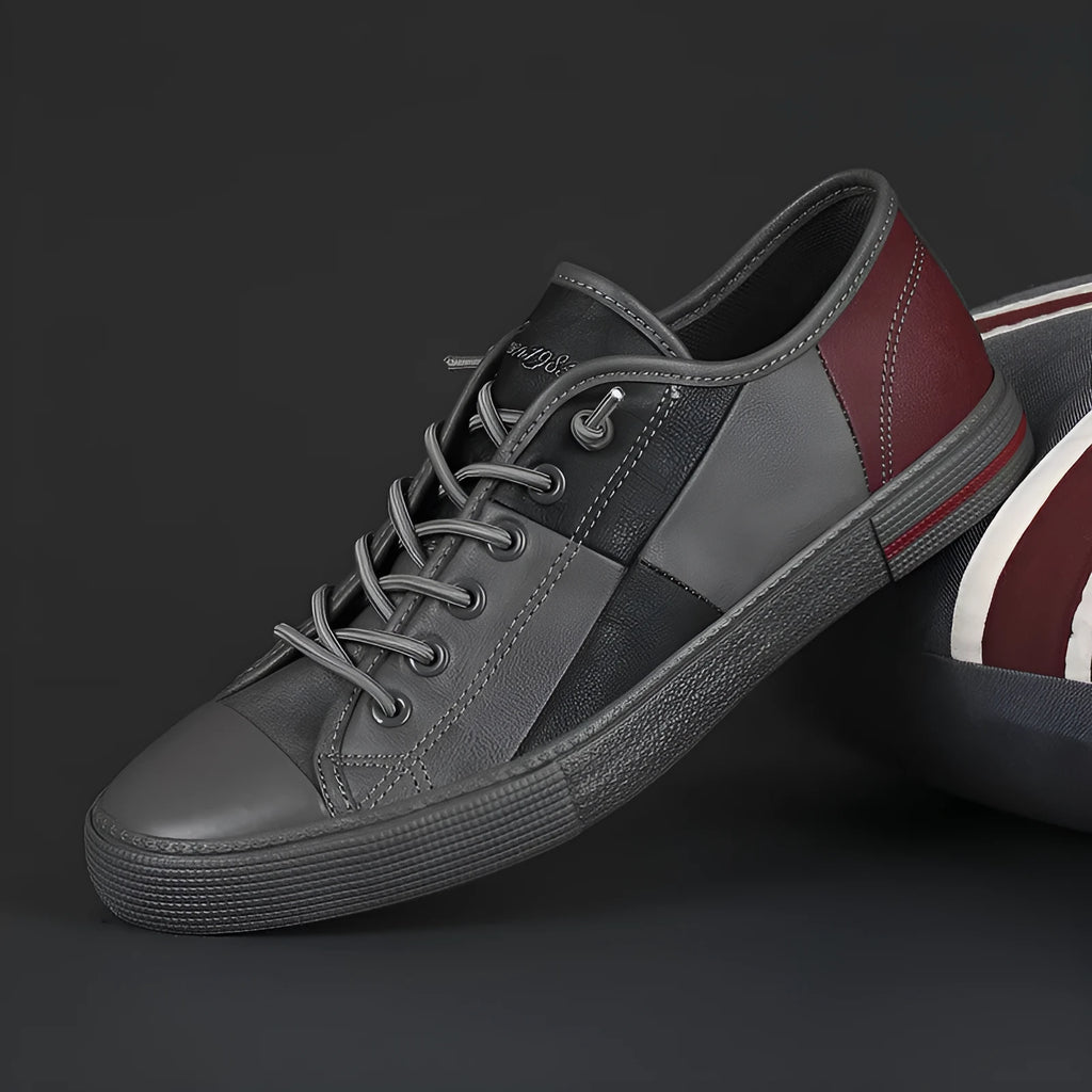 Men's leather shoes with elastic band fastening in black and white colour combination with rubber soles