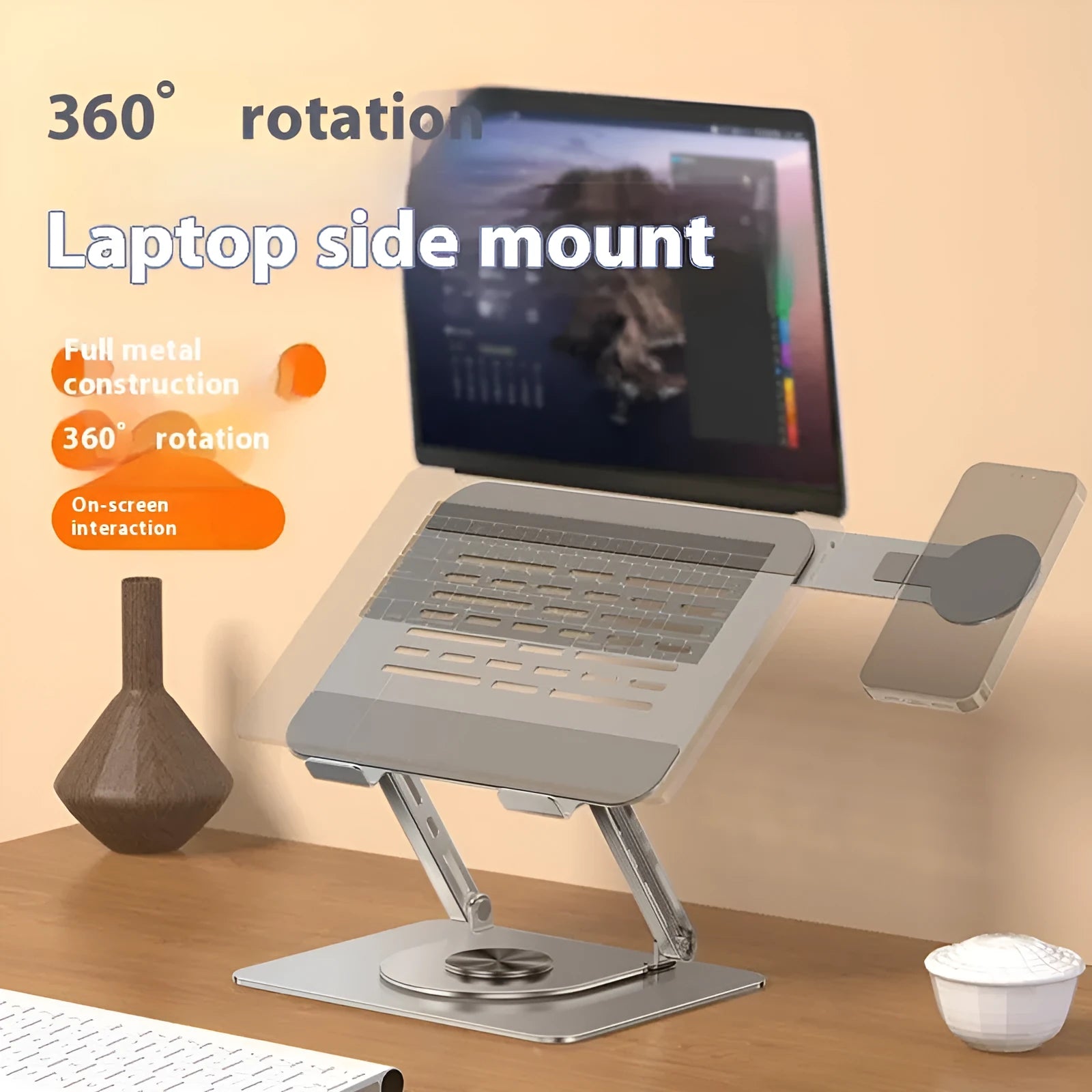 Silver carbon steel laptop stand with a rotating arm and magnetic mobile phone holder.