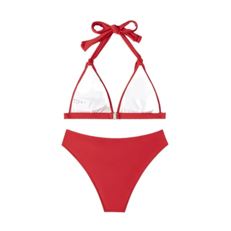 Red women's bikini with lace-up halterneck and split shorts