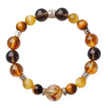 Yellow Tiger-eye crystal bracelet with 10mm geometric tower beads on wrist